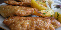 Zámečtí kuřecí rarášci: Křupavé a šťavnaté kousky masa jsou obalené v těstíčku se speciální surovinou, která jim dodá říz