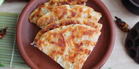 Osúch aneb Valašský langoš: Recept na tradiční pečenou placku s česnekem nezklame