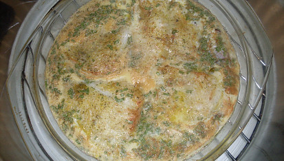 Pangasius pod vajíčkem, zapečeno