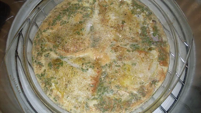 Pangasius pod vajíčkem, zapečeno