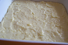 před upečením