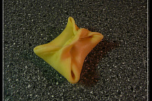 smáčknutý šáteček