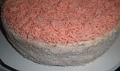 Dort patrový růžovo-bílý (strany pomažeme krémem a posypeme kokosem, vršek ozdobíme cukrářskou zdobící špičkou)