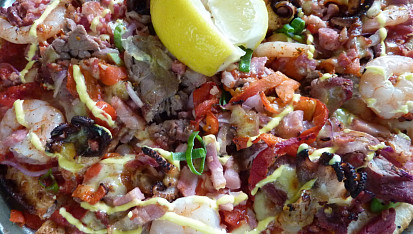 Chobotnice, krevety, mušle, kalamari na pizze