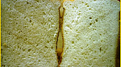 Smetanový chléb z pekárny, na řezu
