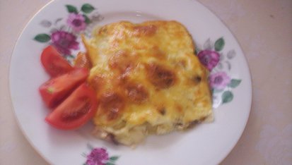 Zapečené brambory se slaninou a sýrem, porce zapečených  brambor