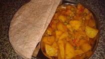 Rychlé Aloo gobi aur mater (brambory s květákem a hráškem)