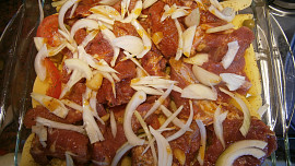 Vepřová krkovička zapečená s brambory, rajčaty a olivami