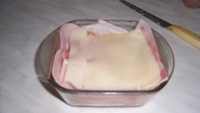 Zapečená Niva se šunkou, sýrem  a vejci, 4 krok