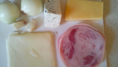 Žampióny pikantní, zapečené, plněné nivou a eidamem