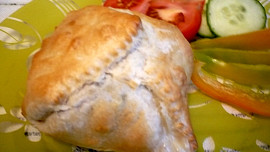 Hermelín skrytý v listovém těste