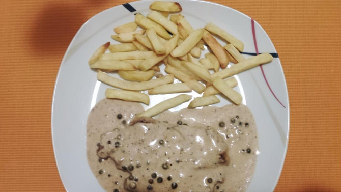 Plátky z krkovičky s omáčkou ze zeleného pepře