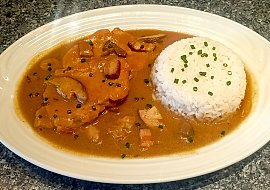 Vepřový plátek na slanině s houbami