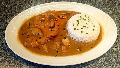 Vepřový plátek na slanině s houbami